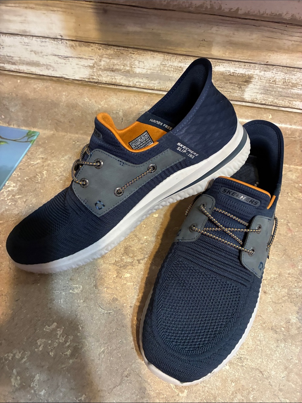 Skechers Men's Size 12 Navy Knit Slip-On Sneakers with Orange Liner - Picture 10 of 11